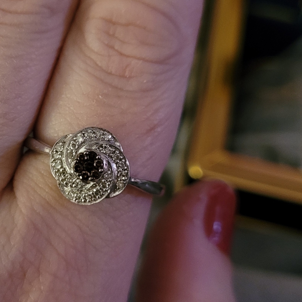 Sterling silver ring with clear and brown stones